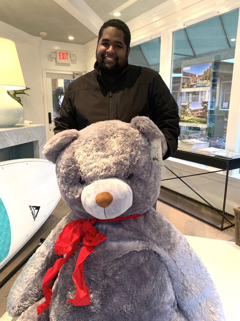 Martha's Vineyard Teddy Bear Suite Raffle Winner Ralston Francis picks up His Big Bear At The Point B Realty Office